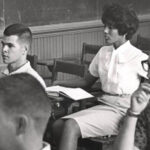 Picture of Vivian Malone Jones sitting in classroom