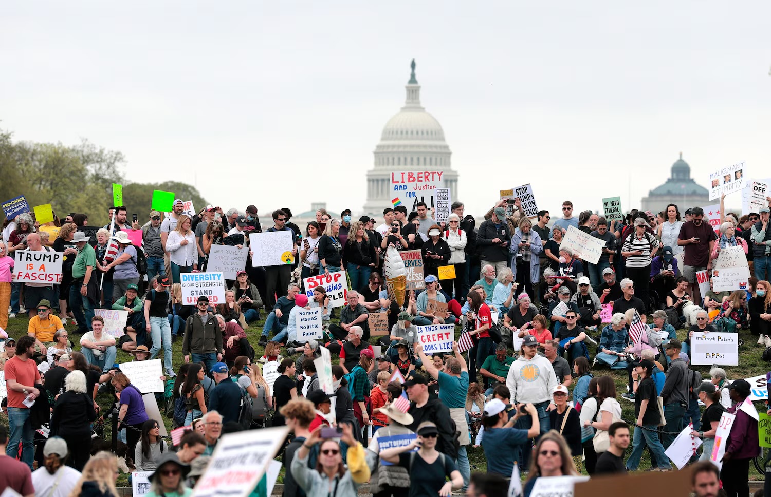 Protesters attend a "Hands Off" rally to demonstrate against President Donald Trump on the National Mall, on April 5, 2025, in Washington, D.C.