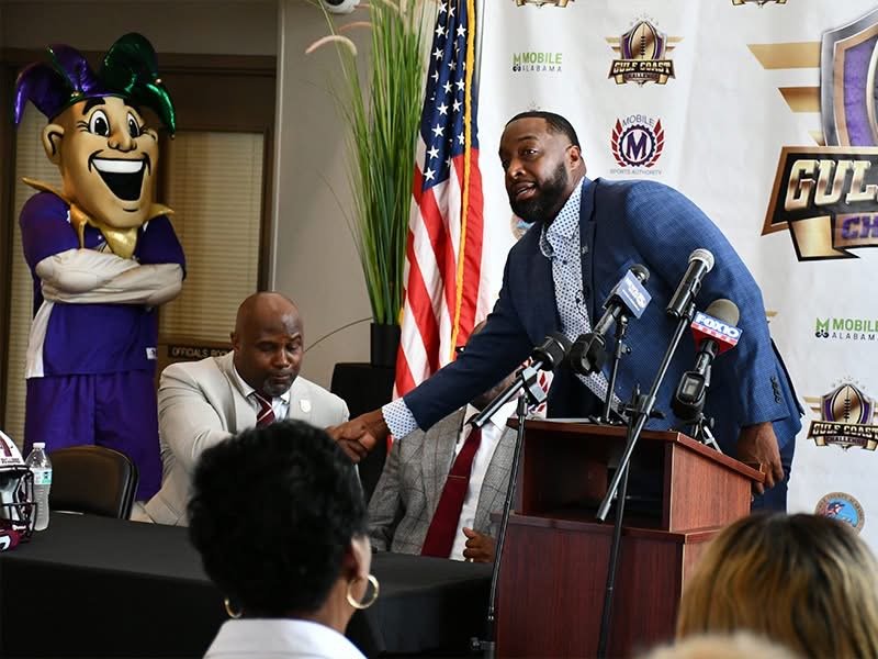 Jackson State coach T.C. Taylor and Alabama A&M coach Sam Shade shake hands at the 2026 Gulf Coast Challenge press conference.