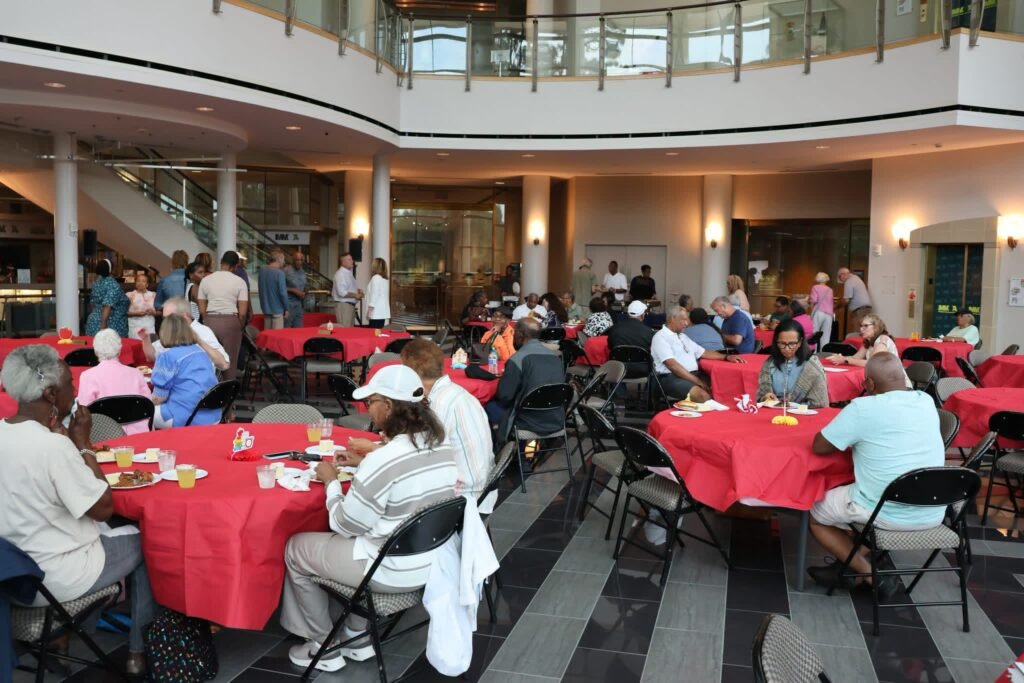 District 7 citizens enjoy dinner at the Back-to-School celebration at the Museum of Art