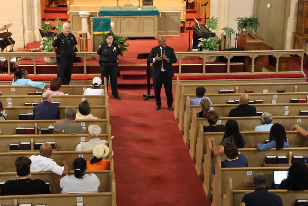 Councilman Cory Penn speaking during the community meeting at Toulminville Warren Street United Methodist Church with local representatives and residents.