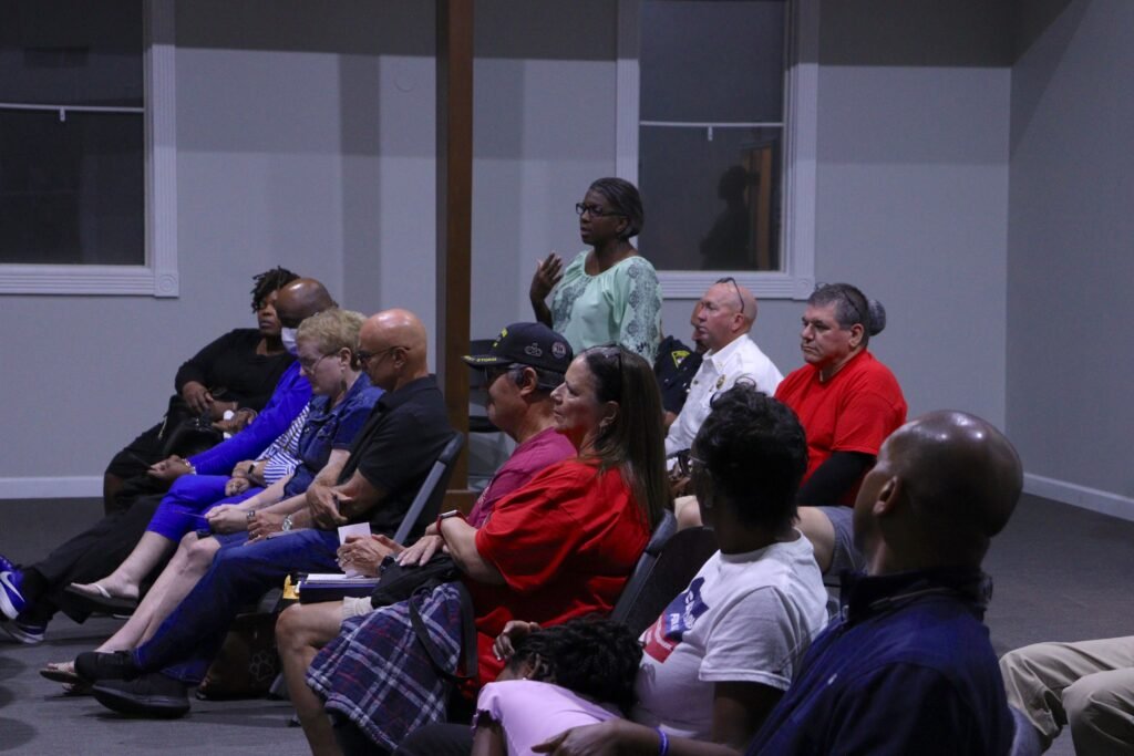 A local resident speaking up during the Q&A session at the District 4 community meeting.