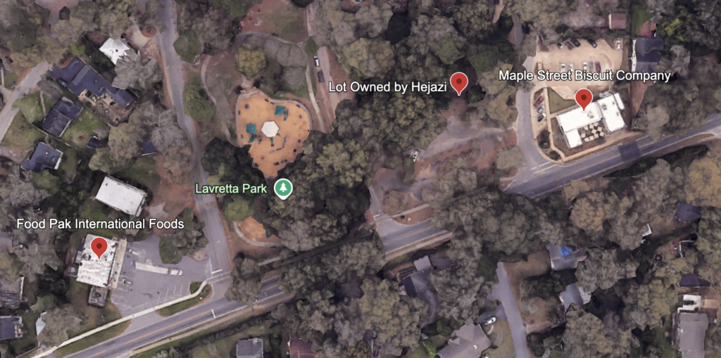 Satellite map view showing Food Pak International Foods, Lavretta Park, a lot owned by Hejazi, and Maple Street Biscuit Company in Mobile, Alabama.