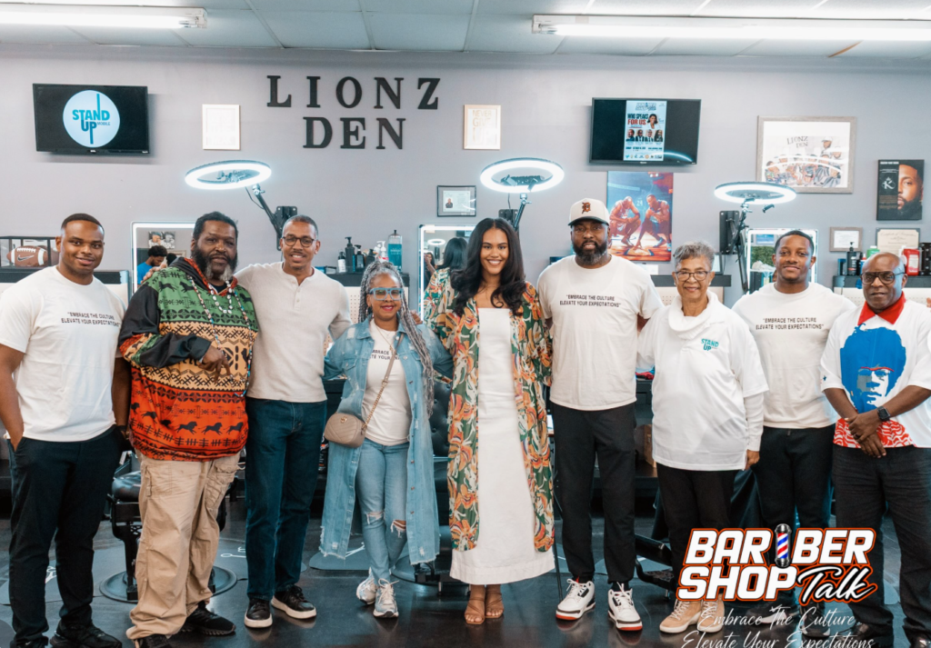 Group photo of organizers and panelists posing at the Barbershop Talk event in Mobile AL. 